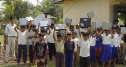 Children in a remote Cambodian school where a pilot laptop program has been in place since 2001.