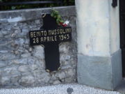 Cross marking the place in Mezzegra where Mussolini was shot.