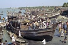 Fishermen near the town of Cox's Bazaar in southern Bangladesh. Many industries in Bangladesh are still primitive by modern standards.