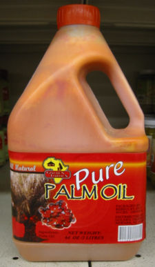 Palm oil from Ghana with its natural dark color visible, 2 litres