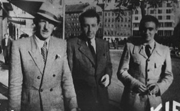 Bratislava, June-July 1944. Vrba on the right, and on the left, Arnost Rosin, who escaped from Auschwitz on May 24, 1944. The man in the middle is Josef Weiss, who worked for the Bratislava Ministry of Health. He secretly made copies of the Vrba-Wetzler report, which the escapees kept hidden behind a picture of the Virgin Mary in an apartment they were renting. 