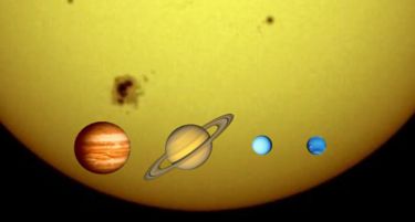 The four gas giants against the Sun: Jupiter, Saturn, Uranus, Neptune. (Sizes to scale.)