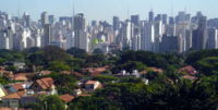 The building-dense Avenida Paulista surroundings as seen from the mostly low-rise neighborhood of Jardins