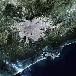 A simulated-colour satellite image of the Greater São Paulo metropolitan area (centre), Campinas (above), Sao Jose dos Campos (right), and the coastal towns of Santos and São Vicente (below)