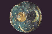 A bronze disk, 1600 BC, from Nebra, Germany, is the one of the oldest known representations of the cosmos. The Pleiades are top right. See Nebra sky disk