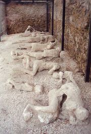 Some plaster casts of victims of the eruption still in actual Pompeii, many are in the Archaeological Museum of Naples.(Casts can also be found, amongst other places,near the forum, inside the baths and at The villa of the mysteries)