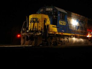 CSX Local B-730 at Salt City industrial facility in Westfield, Massachusetts, 2005-04-05 at 7:00 pm, powered by EMD GP40 locomotives, numbers 6245 and 6230