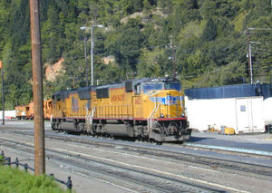Two SD70 diesel locomotives of the Union Pacific refueling at Dunsmuir, California.