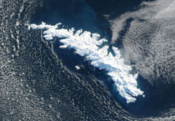 NASA satellite image of South Georgia island covered with snow.