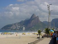 Ipanema beach, in the South Zone, as featured in the Tom Jobim and Vinicius de Morais song The Girl from Ipanema. Dois irmãos belvedere can be seen in the background.