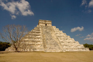 el Castillo; one of the larger structures at the Chichen Itza site. The excavation and restoration of this important Maya site were largely due to Morley; two sides of the building shown here were rebuilt under his direction.