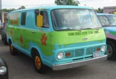 A 1968 Chevrolet Sportvan 108, painted to look like the Mystery Machine from Scooby-Doo. A number of Scooby fans have decorated vans in this fashion.