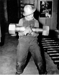 An 87.5 kg (192.9 lb) nut and bolt, one of sixteen used to join sections of the generator shaft of a 75000 kW generator at Grand Coulee Dam in 1942