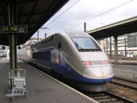 A TGV Duplex trainset (coupled to a Reseau trainset) leaving Paris Gare de Lyon.