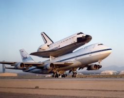 Space Shuttle Endeavour being carried on top of a Boeing 747 Shuttle Carrier Aircraft.