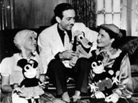Disney introduces his popular creations: Mickey, Minnie Mouse and Pluto to Hansel and Gretel (Dorothy Rodin and Virginia Murray).