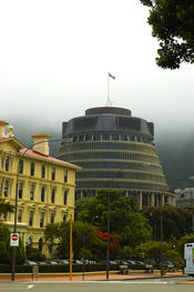 The old Government Buildings (now a law school) on the left and the Beehive, Parliament's Executive Wing, in the centre. Parliament House is to the right (small part shown).