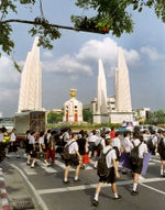 Democracy Monument and pupils in Bangkok.