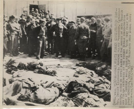 General (later US President) Dwight Eisenhower inspecting prisoners' corpses at a liberated concentration camp, 1945