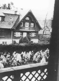 Dachau concentration-camp inmates on a death march through a German village in April 1945. Courtesy of the United States Holocaust Memorial Museum.