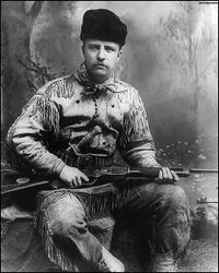 Theodore Roosevelt as Badlands hunter in 1885. New York studio photo. Note the engraved knife and rifle courtesy of Tiffany and Co.
