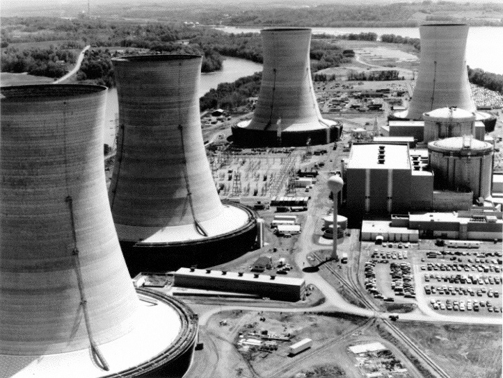 Three Mile Island Nuclear Generating Station consists of two nuclear power plants, each with its own containment building and cooling towers. TMI-2, which suffered a partial meltdown, is in the background.