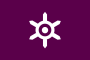 Flag of Tokyo. The sun is a stylized Kanji character of Tokyo-Nihon, which represents the developing capital city Tokyo. Adopted October 1, 1964.