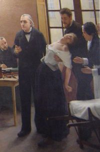 Jean-Martin Charcot (1825 - 1893) was a French neurologist and professor who bestowed the eponym for Tourette syndrome on behalf of his resident, Georges Albert Édouard Brutus Gilles de la Tourette.  Charcot is shown here during a lesson with a "hysterical" woman patient at the Salpêtrière hospital.