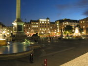 Trafalgar Square at night.