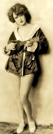 Ukulele in the hands of a Ziegfeld Follies chorus girl, c. 1920