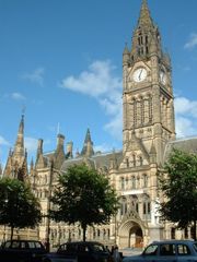 Manchester Town Hall. Many towns and cities in the UK have impressive town or city hall buildings as administrative headquarters for local government