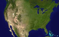 A satellite composite image of the contiguous U.S.  Deciduous vegetation and grasslands prevail in the east, transitioning to prairies, boreal forests, and the Rocky Mountains in the west, and deserts in the southwest. In the northeast, the coasts of the Great Lakes and Atlantic seaboard host much of the country's population.