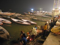 People performing Hindu ceremony at one of the ghats of Varanasi