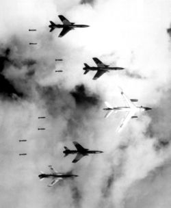 U.S. F-105 aircraft dropping bombs.