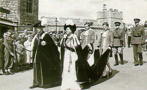 George VI and Queen Elizabeth, lead the processions of Knights of the Garter from the castle's Upper Ward to St George's Chapel.