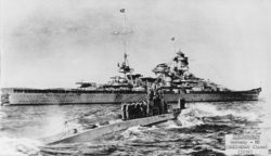 The U-Boat U-47 returns from sinking HMS Royal Oak, with the battleship Scharnhorst in the background