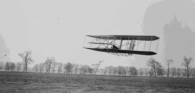 Orville in flight over Huffman Prairie, approximately 1,760 feet in 40 1/5 seconds, Nov. 16, 1904.
