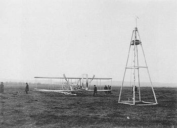 Wright Model A Flyer and launching derrick, France, 1909