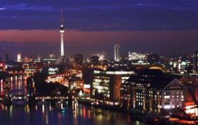 Central Berlin by night seen from the Allianz building in Treptow, showing the Universal building on the right at the river Spree and the TV-Tower at Alexanderplatz