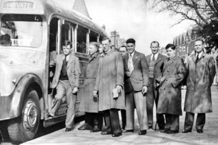 Alan Turing, on the steps of the bus, with members of the Walton Athletic Club, 1946.