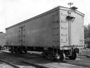 A Swift refrigerated boxcar sits idle at East Orange, New Jersey. The car has been repainted to remove the original "billboard" advertising after such displays on freight cars were banned by the ICC in 1937.
