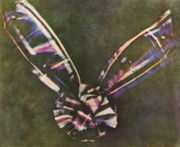 The first permanent colour photograph, taken by James Clerk Maxwell in 1861.