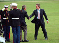 Blair welcomes US President George W. Bush to Chequers, the Prime Minister's countryside retreat.