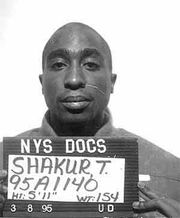 Tupac in a police mugshot (March 8, 1995)