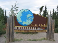 A sign along the Dalton Highway marking the location of the Arctic Circle