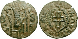 Coin of King Armah seated on throne.