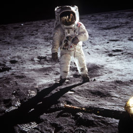 Buzz Aldrin poses on the Moon allowing Neil Armstrong to photograph both of them using the visor's reflection.