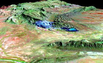 A false-color NASA image of the Argyle mine. Blue colours show the location of the mine and its depressed elevation as a result of the open pit mining technique.