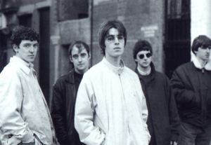 Oasis original line-up, 1991-1995: Tony McCarroll, Paul Arthurs, Liam Gallagher, Paul McGuigan and Noel Gallagher