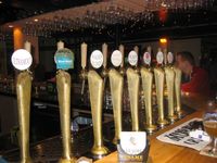 Draught beer keg fonts at the Delirium Café in Brussels